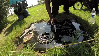 Father receives headstone for son's grave