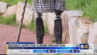 Double amputee climbs mountain
