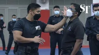 New tactics for Singapore prison officers