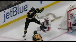 Charlie McAvoy responds with a big hit on Trevor van Riemsdyk