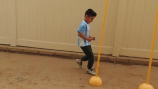 Five year old soccer player Izayah Morales #10 U6 training