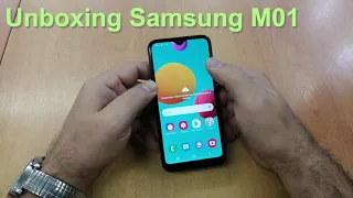 Samsung M01 распаковка нового смартфона. Первый запуск.