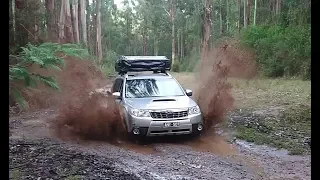 Subaru Forester XT with rooftop tent and bfg ko2 VS 80 series landcruiser off road in Warburton