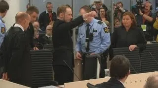 Norway mass killer Anders Breivik gives far right salute as he arrives in court