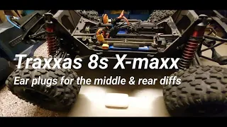 How 2 Traxxas Xmaxx 8s silicone ear plugs fitting into the  center diff & rear diff.