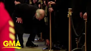 King Charles III picks up person's cane during UK Parliament visit l GMA