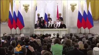 Putin signs Russia-Crimea treaty