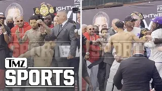 Tank Davis Pushes Rolly Romero Off Stage At Weigh-In, Brawl Nearly Erupts | TMZ Sports