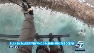 Crews rescue driver who drove off PCH, crashed into ocean in Malibu