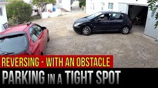 Parking in a Tight Spot: Reversing – With an Obstacle