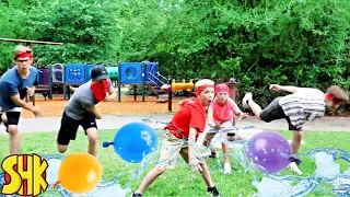 Sneaky Summer Camp Water Balloon Battle! with SuperHeroKids Summer Funny Family Videos Compilation
