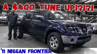 How can a tune up cost $400? CAR WIZARD explains how modern maintenance is done on this '11 Frontier