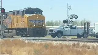 WATCH: Train hits truck stuck on tracks in Midland County