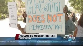 Protesters hold "Shame on McCain" rally near downtown