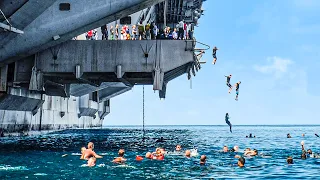 Why US Navy Sailors Risk Their Lives to Jump Off an Aircraft Carrier in Middle of the Sea