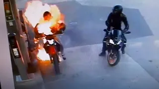 Motorcycle Catches Fire at Petrol Station