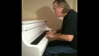 "House of the Rising Sun" played by Peter Vamos on the piano.