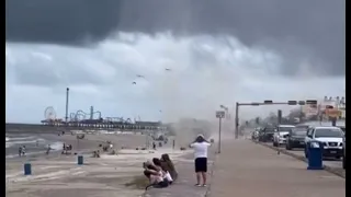 Scary video of waterspout blowing people over in Galveston