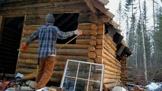 Installing the front window: OFF GRID LOG CABIN BUILD