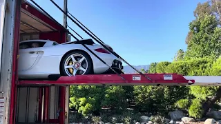 White Porsche Carrera GT delivery