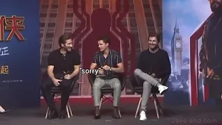 Tom Holland offering his drink to his husband (Jake Gyllenhaal)