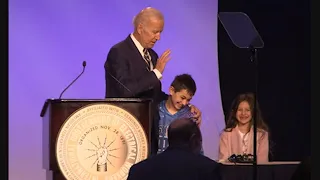 Biden jokes about giving hugs in pro-union speech