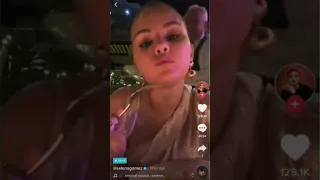 Selena Gomez listening to “34+35” by Ariana Grande via TikTok