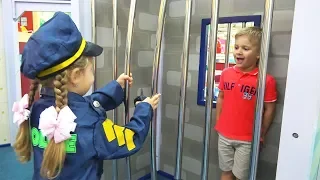 Roma and Diana pretend play at the amusement park