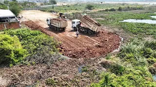 Special Technique New Road Building Operator Bulldozer Pushing Clearing Dirt Into Water Dump Truck