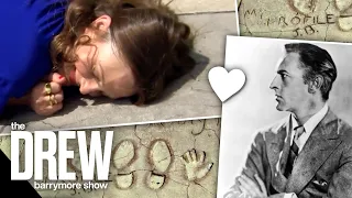 Drew Puts Her Face in Her Grandfather’s Face-Print at the Famous Grauman's Chinese Theater