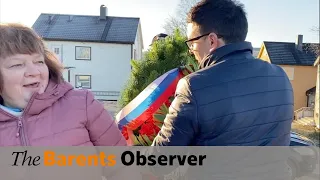 Russian residents and Norwegian mayor argue next to the Soviet Red Army memorial in Kirkenes.