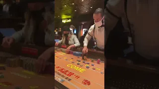 LAS VEGAS SATURDAY NIGHT Craps table at Golden Gate Hotel & Casino on Fremont Street ACTION VIEW