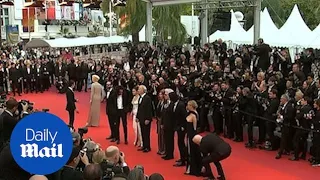 Selana Gomez and Tilda Swinton pose for the cameras at cannes