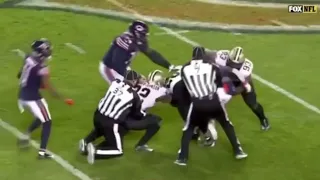 A New Orleans Saints player gets his chain snatched during the game