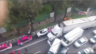 Semi-Truck Tractor Trailer Lorry Plows Through Traffic Jam Crashing Into Cars