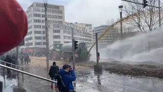 Protesting farmers spray manure at police during demonstration in Brussels