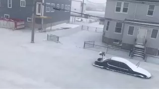 Cars freeze in floodwaters in Revere, Massachusetts