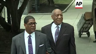 Topless Woman Charges Bill Cosby at Retrial
