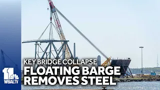 New video shows floating barge removing large pieces of Key Bridge