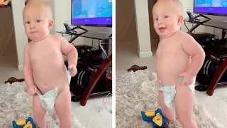 Cheeky Baby Tries To Take His Diaper Off