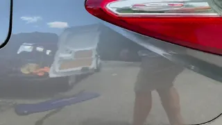 Toyota Camry Severely Dented Quarter Panel