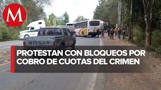 Pobladores bloquean carreteras para pedir un alto a la inseguridad en Michoacán