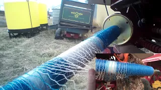 Putting net wrap in the new holland baler
