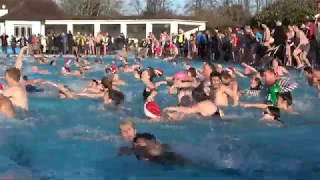 Brave swimmers tackle icy Christmas Day plunge