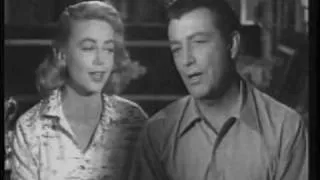 "You Found Me and I Found You" performed by Robert Taylor and Dorothy  Malone