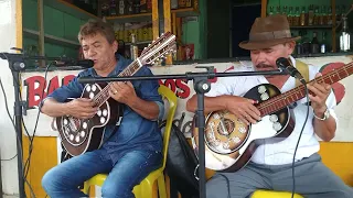 Manoel Alves poeta Pereira Santos em grande cantoria em Sapé na barraca dos amigos