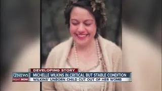 Michelle Wilkins in critical condition after unborn child cut out of womb