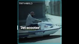 Man drives his modified jet ski on the road