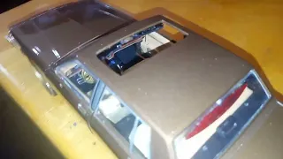 1/24 scale box Chevy Caprice unboxing results of greenlight highway patrol car.