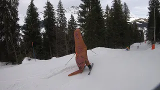 T-Rex Dinosaur costume skiing